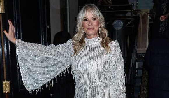 Tamzin Outhwaite, 53, exudes glamour in a silver glitzy dress