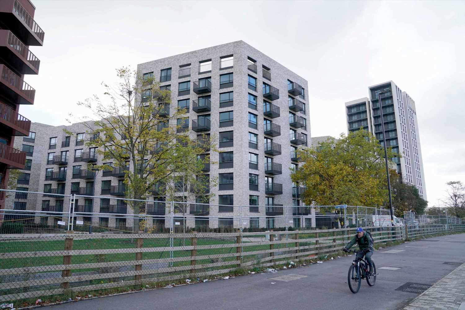 We live in 'ghost village' left empty after Commonwealth Games… it looks incredible but our area is a 'half-cooked meal' | The Sun