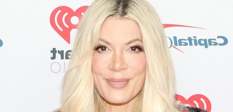 Tori Spelling shows off VERY slim figure at Jingle Ball in LA